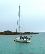istana-anchored-at-maitresse-ile-in-the-plateau-des-minquieres-john-goodall_22816510873_o